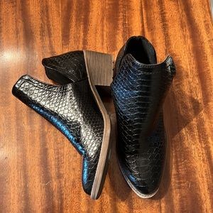 Volatile black booties